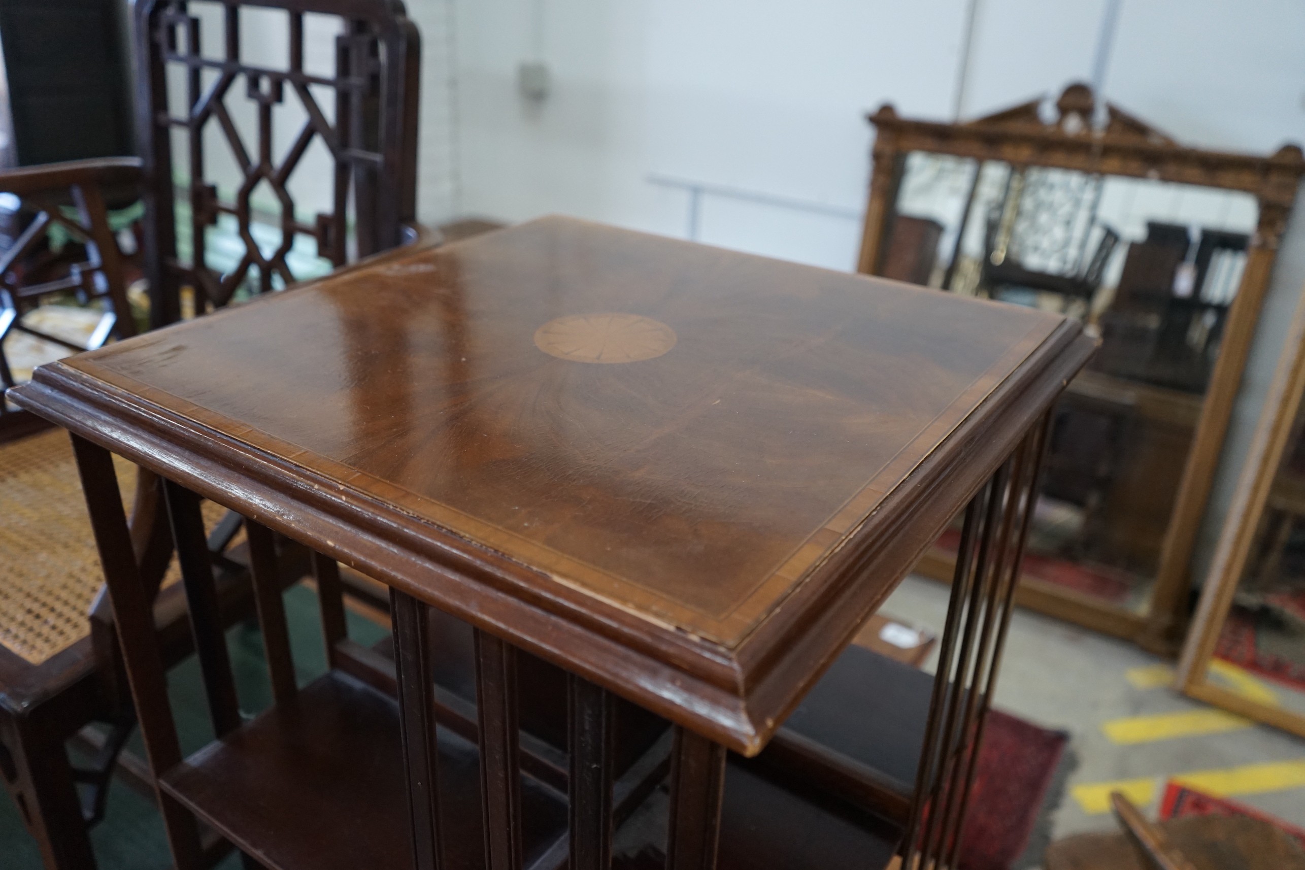 An Edwardian style mahogany revolving bookcase, width 50cm, height 78cm